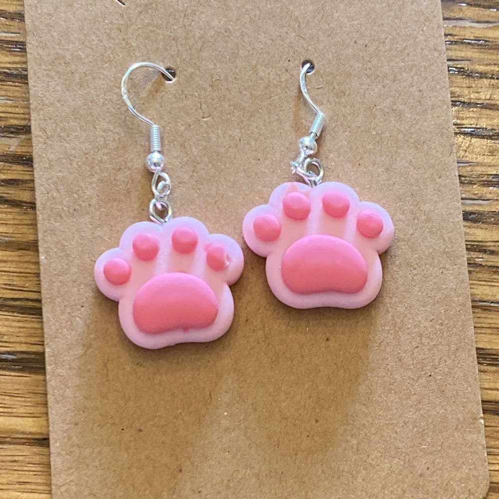 Light pink and hot pink dog paw earrings with silver wires and random gift bag